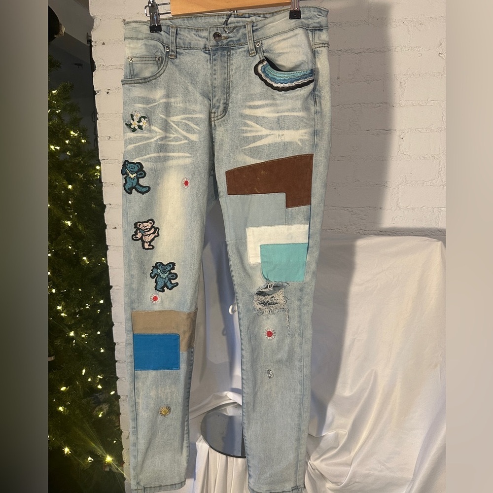 Amiri Grateful Dead thrasher jeans.